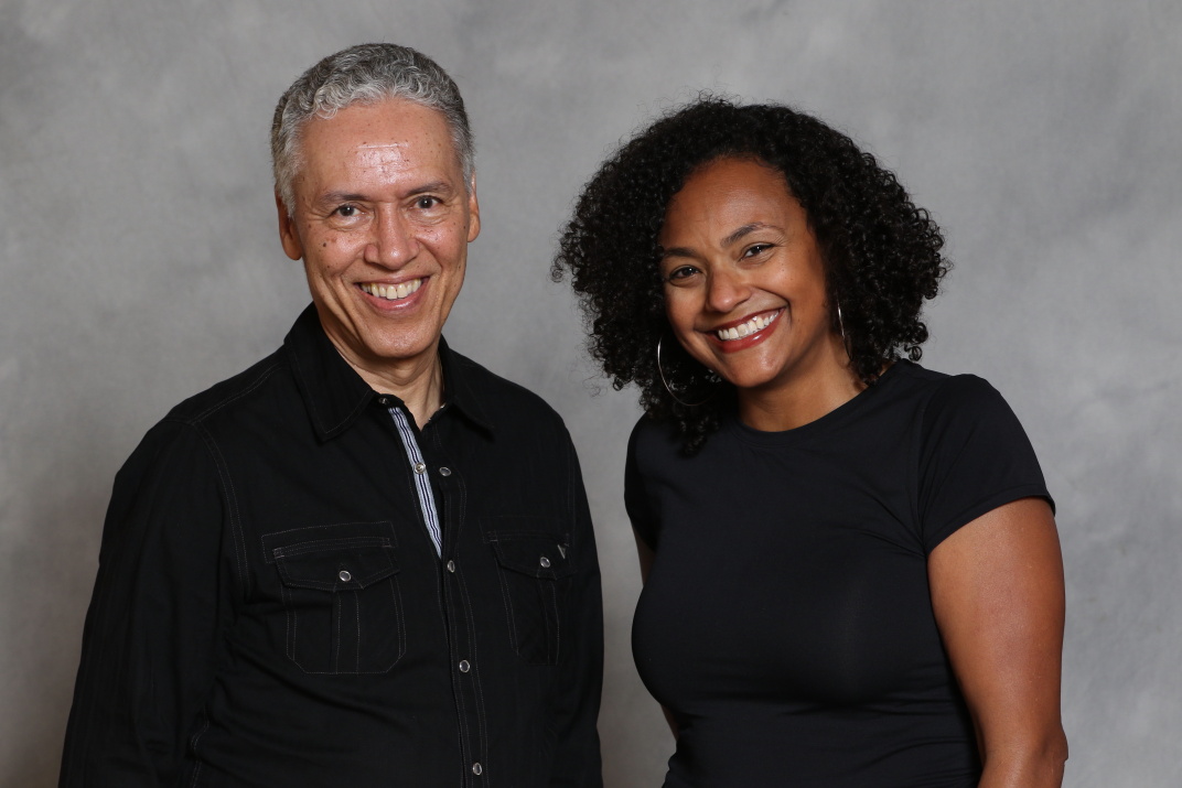diverse group of people collaborating in warm natural light, community gathering, inclusive workspace, warm tones, authentic documentary style photography